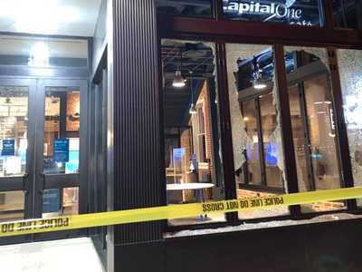 Vandalized windows at Capital One Cafe In Carytown