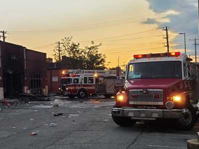 Fire Trucks outside the DTLR Shoes